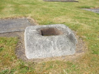 Base of celtic cross in the grounds of St Columba's Church